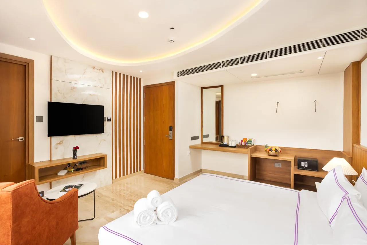 Suite interior at Hotel Explora Calicut with spacious room layout
